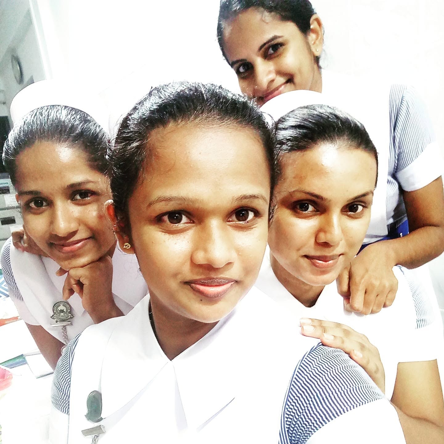Nursing cohort with doctors outside the hospital building